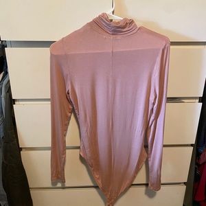 Blush pink turtleneck body suit